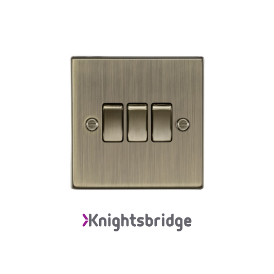 Brass light switch with three toggle buttons on a white background, featuring the Knightsbridge brand.