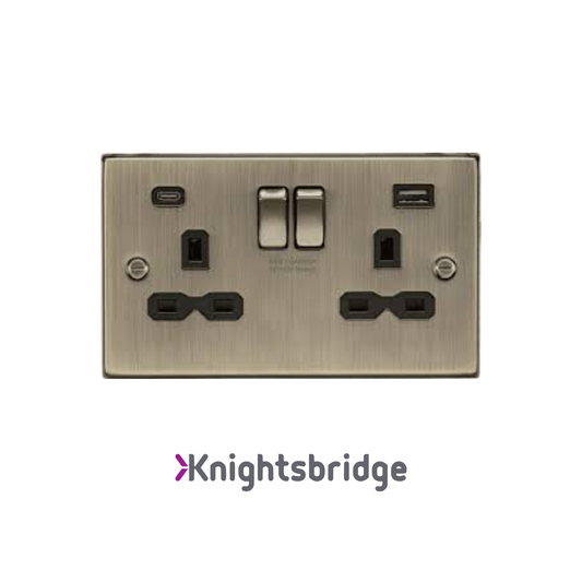 Brass electrical socket with USB ports and switches on a white background, featuring the Knightsbridge brand.