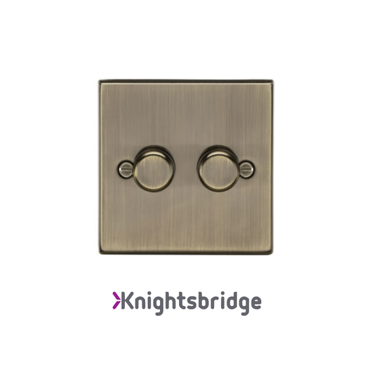 Brass light switch with 'Knightsbridge' branding on a white background
